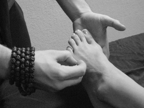 Acupuncture performed on the foot